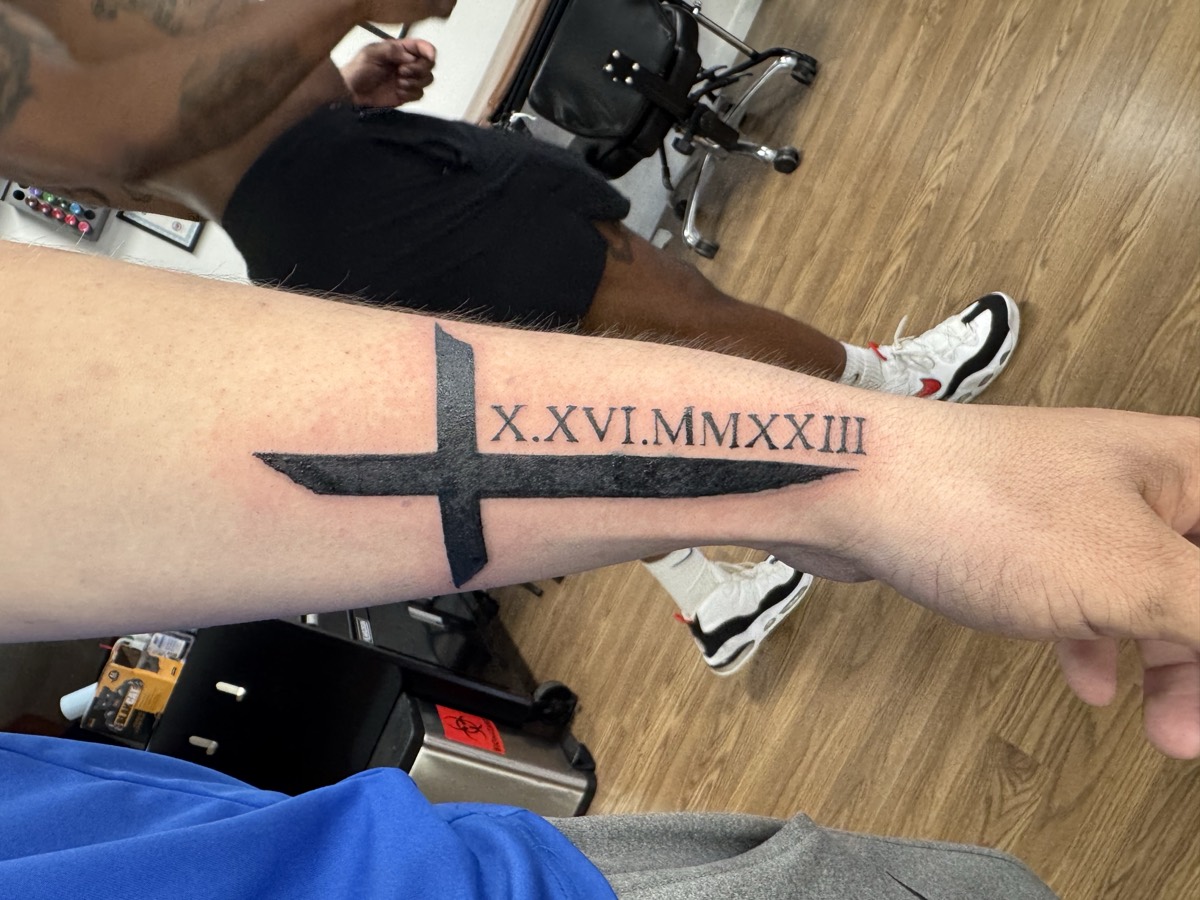 Custom script lettering tattoo by Aliza Nadine Phoenix