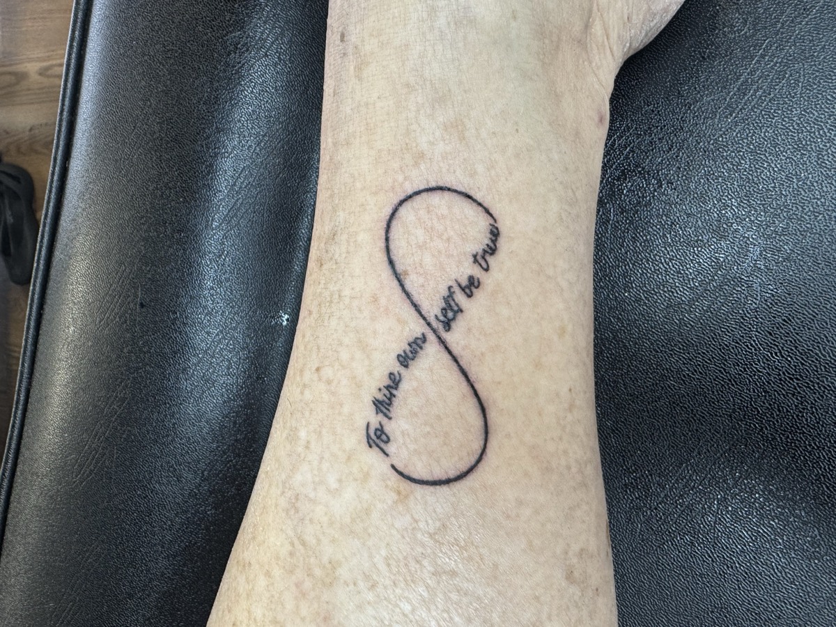 Custom script lettering tattoo by Aliza Nadine Phoenix