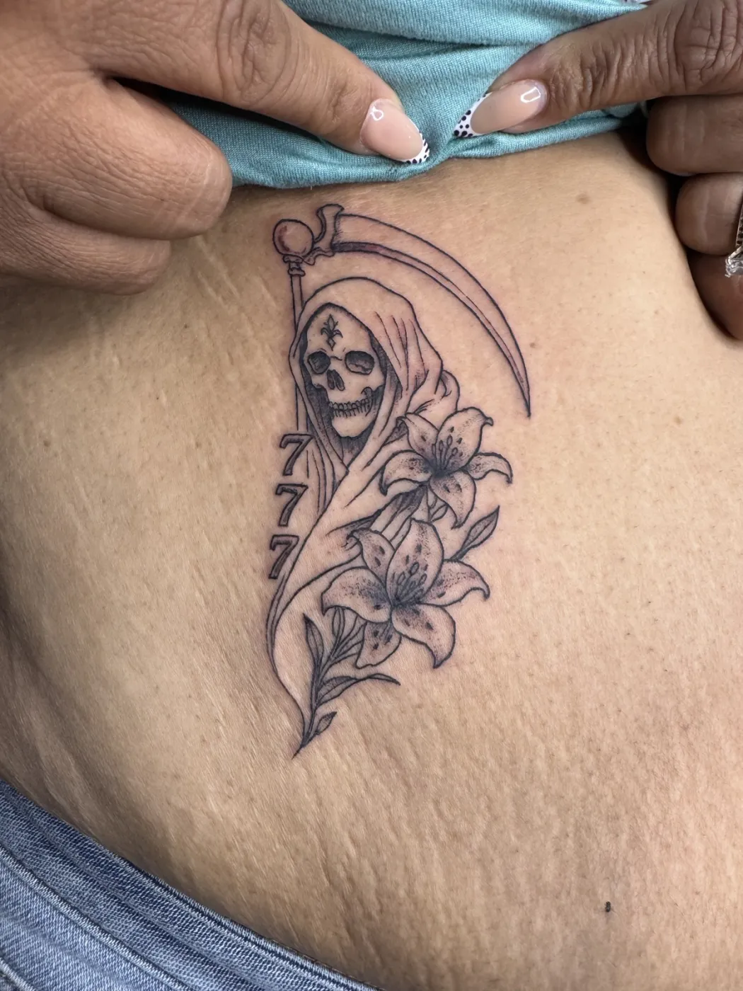 Grim Reaper Lily tattoo — Fine Line by Aliza Nadine Phoenix AZ