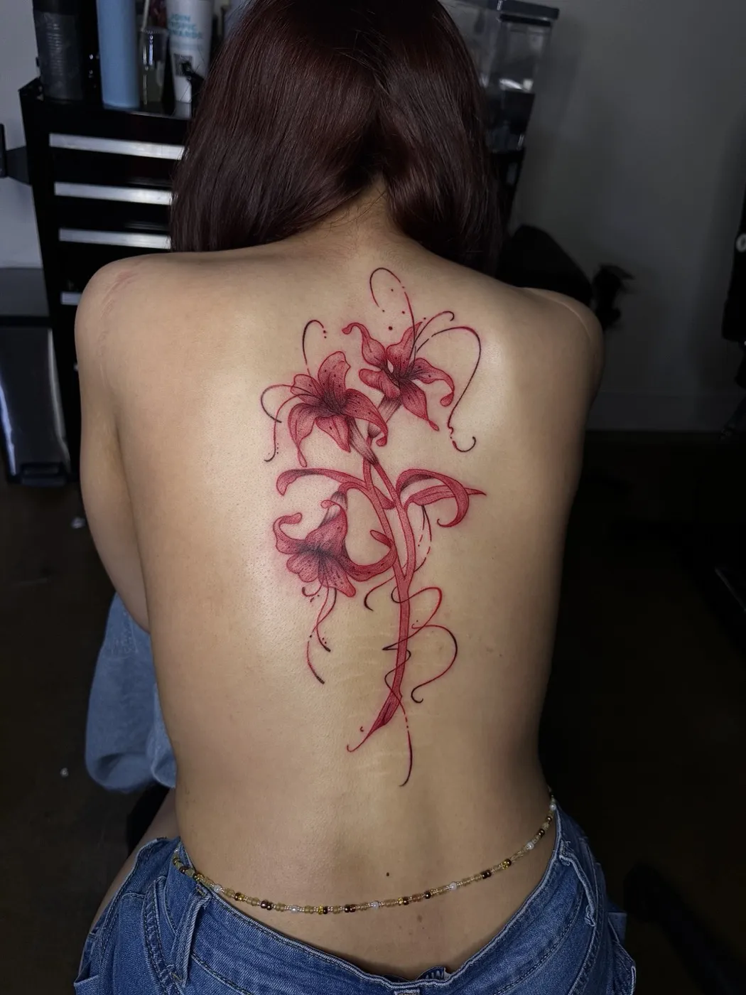 Red Ink Lilies tattoo — Fine Line by Aliza Nadine Phoenix AZ