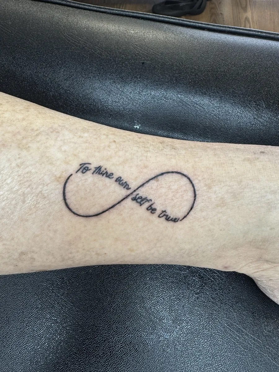 Custom script lettering tattoo by Aliza Nadine Phoenix