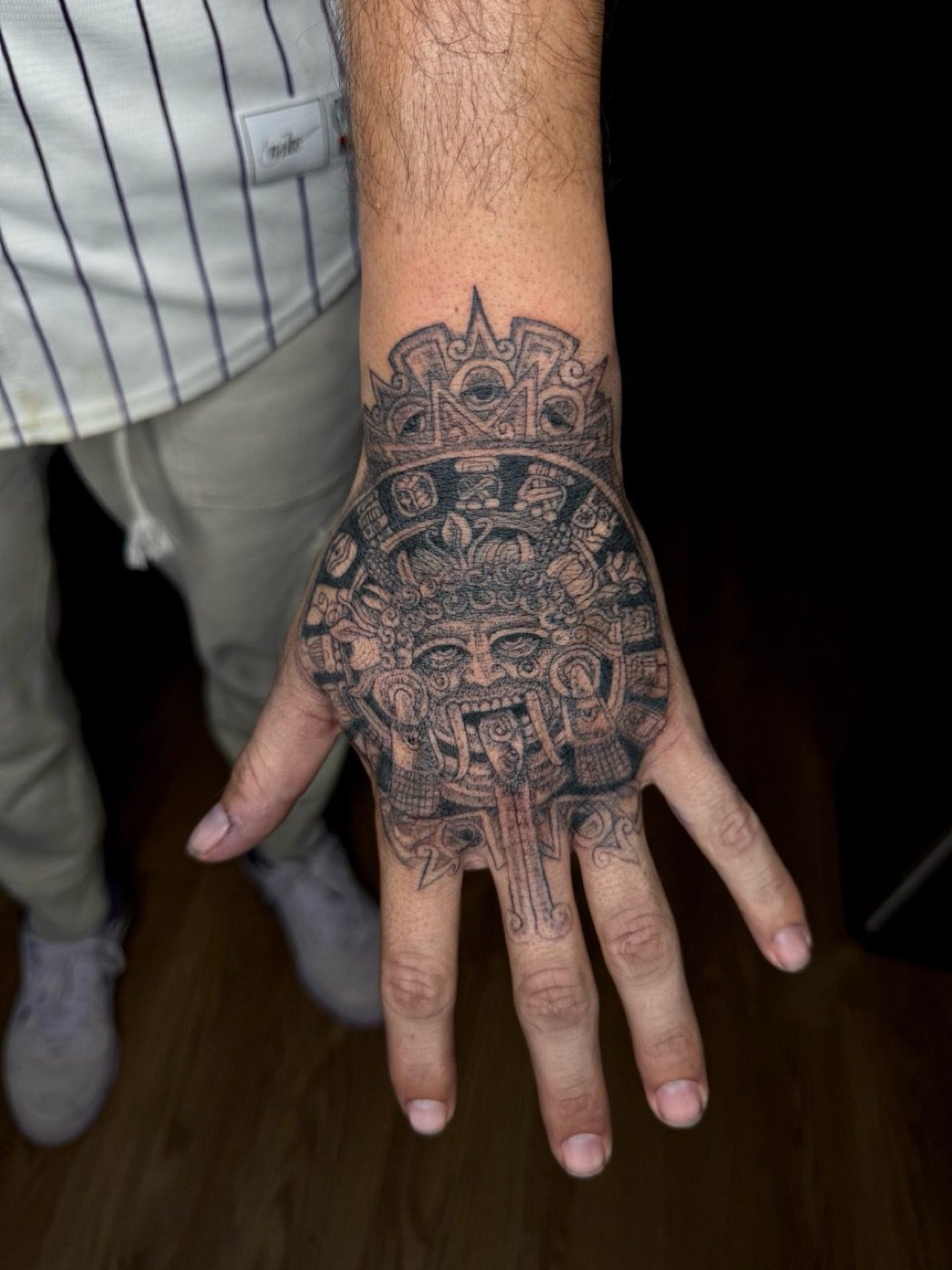 Aztec calendar hand tattoo by Aliza Nadine Phoenix